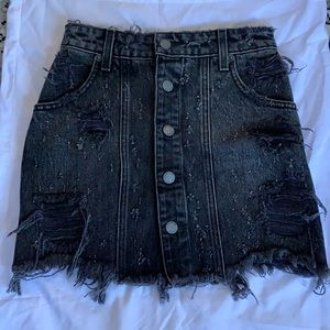 Black mini skirt from Carmar. Size 24